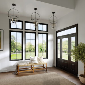 A gorgeous and modern residential entryway with large picture windows.